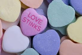 love stinks candy heart